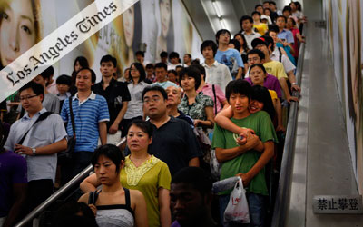 A five-part article examines the implications of world population growth beyond seven billion; SEDAC's Human Footprint data shows where Earth been most impacted.Beyond 7 Billion feature image showing chinese people crowded on an escalator