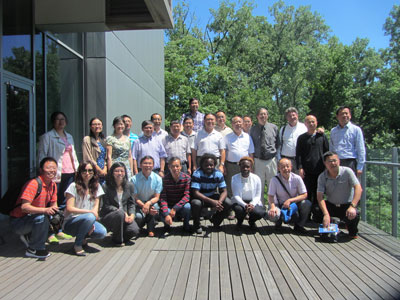 Group of staff from CIESIN, LDEO, and the Agriculture and Food Security Center gather with scientists from the Sichuan Academy of Agricultural Sciences on the back deck of the Comer Building,the Lamont campus.