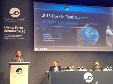 IESIN deputy director Marc Levy at the Eye on Earth Summit 2015 held in Abu Dhabi October 6-8, with panelists to the right.