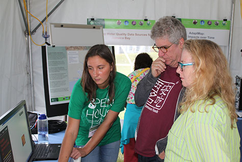 CIESIN staff demonstrates Gridded Population of the World data product to visitors to Lamont Open House