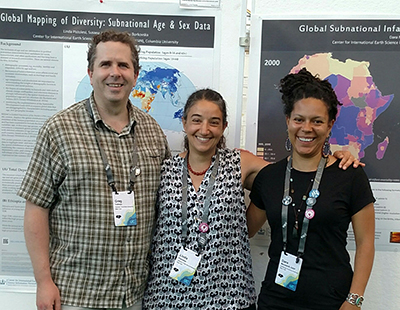 CIESIN associate director for geospatial applications Greg Yetman (left) and geographic information specialists Linda Pistolesi (center) and Dara Mendeloff (right) at the ESRI User Conference Map Gallery Reception July 10–17 in San Diego