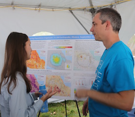 Columbia graduate student Christina Paton discusses Mexico earthquake exposure with staff member John Squires