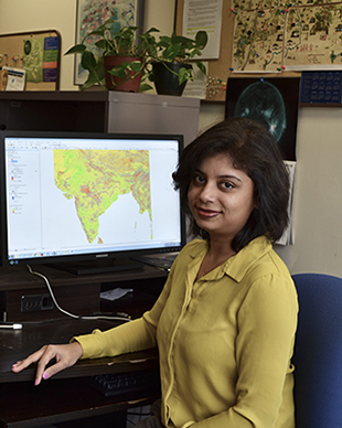 photo of Pinki Mondal at her workstation